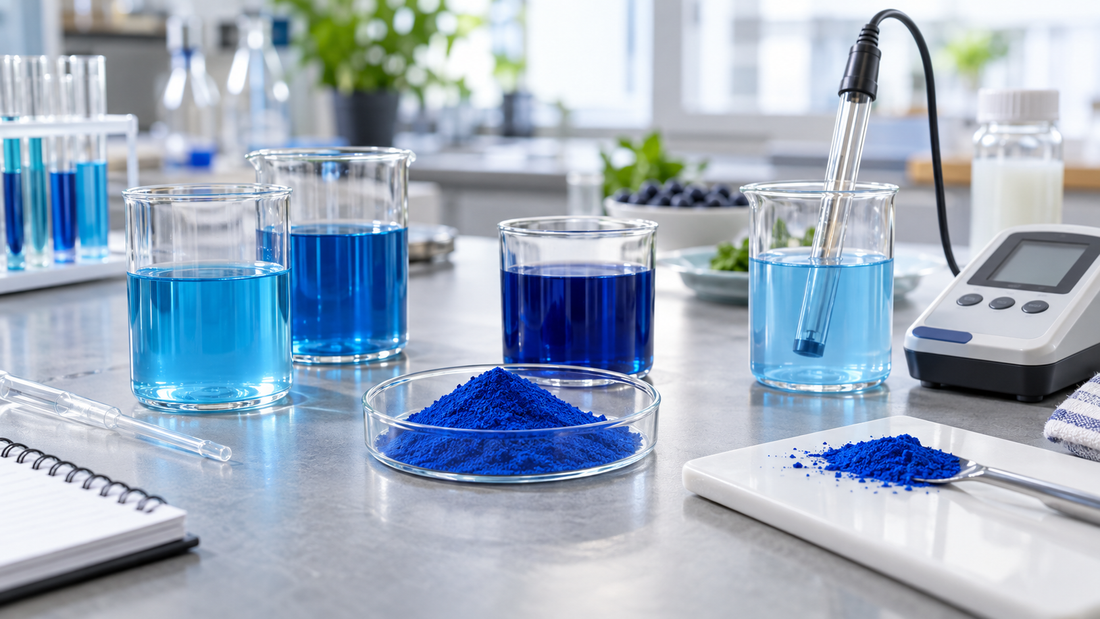 Illustrative beverage R&D bench with blue pigment powder, glass samples and an unbranded pH meter.