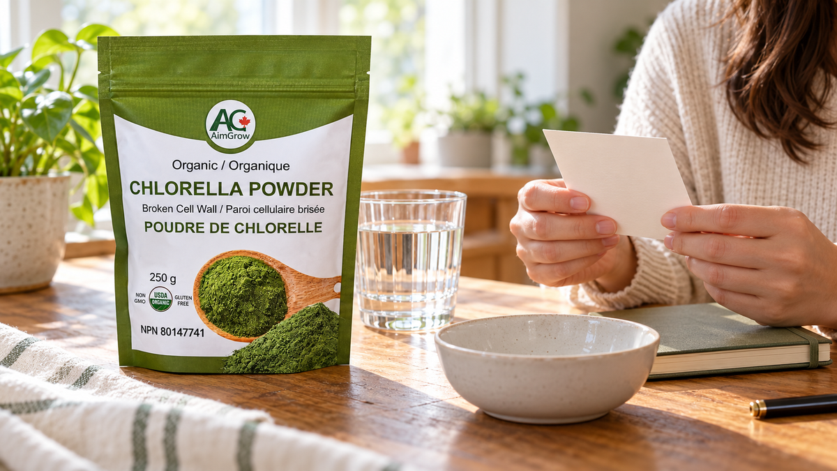 AimGrow 250g Chlorella Powder pouch beside a consumer reviewing packaging at a home table.